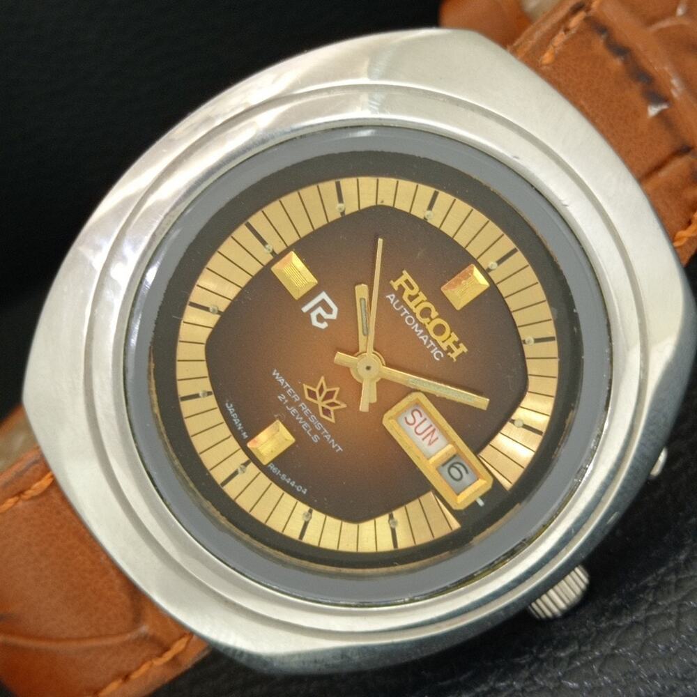 Vintage 1975 Ricoh Automatic Mens Silver Watch W/daydate & Gold accents